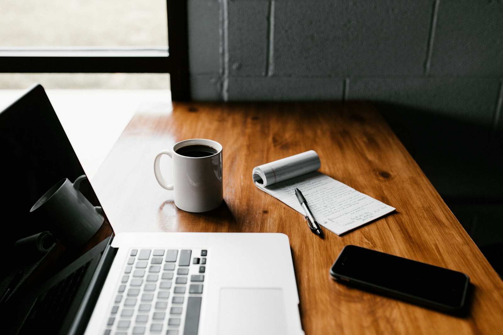 Drafting with coffee at a desk